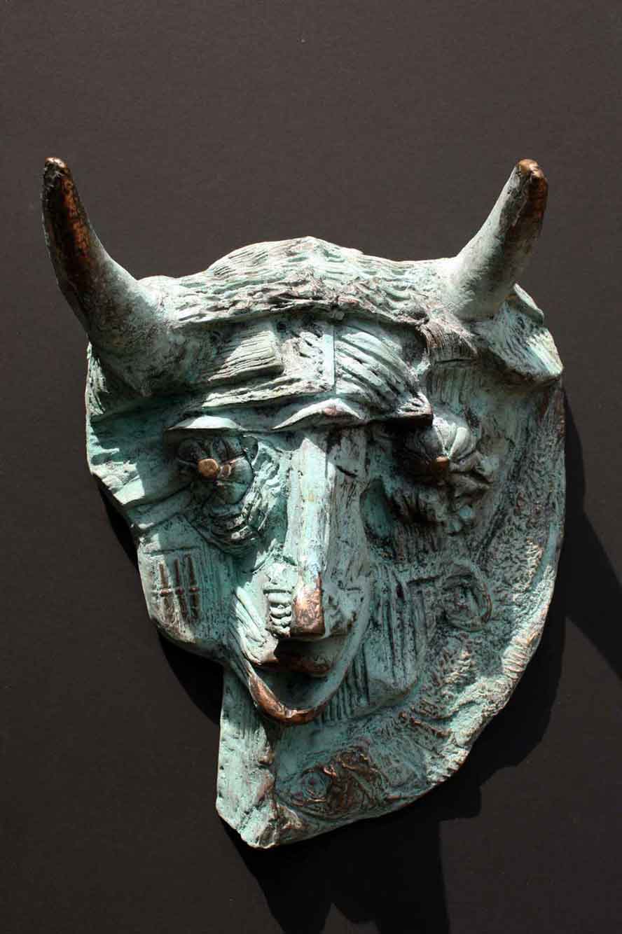 Représentation d'un bronze, titre: Masque